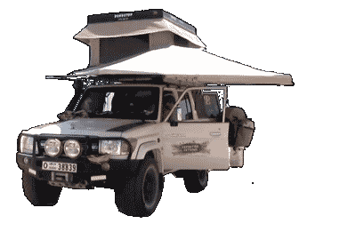 an awning on the side of a 4x4 used for overlanding and off grid camping